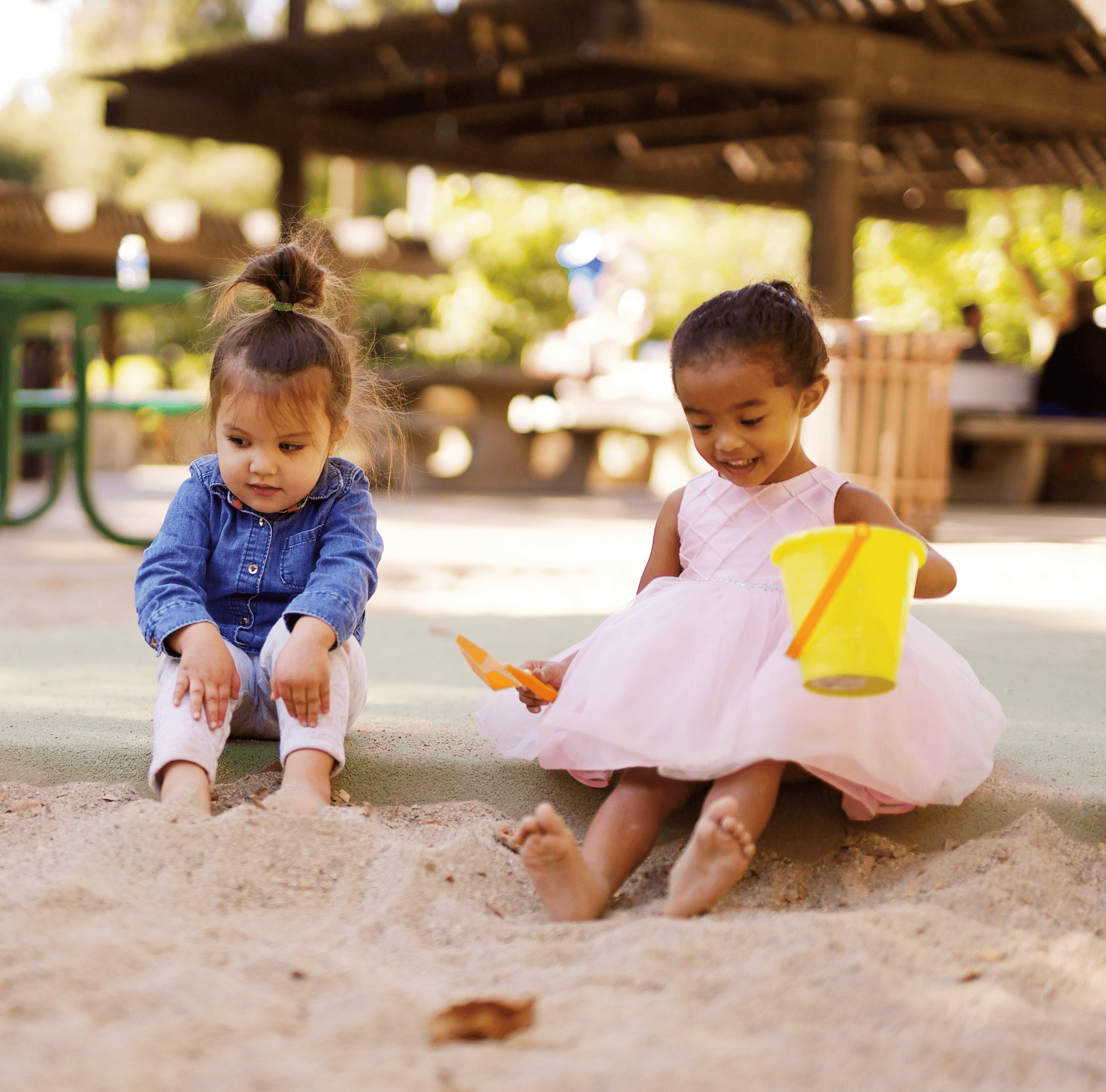 children playing in a sandbox